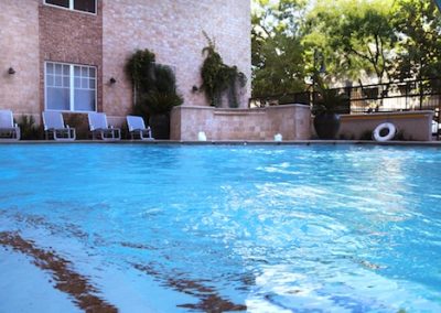 A pool at the quarters on campus apartments