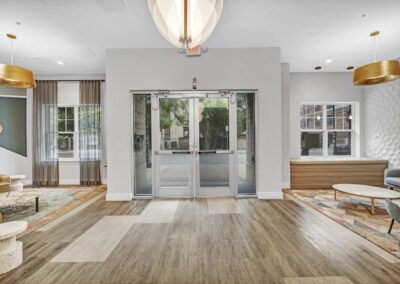 foyer to leasing building with plenty of modern seating and modern lighting